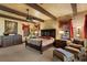 Luxurious bedroom with a large bed and seating area at 33642 Blanton Rd, Dade City, FL 33523