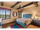 Spacious bedroom with rustic wood furniture and views at 33642 Blanton Rd, Dade City, FL 33523