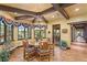 Bright breakfast nook with round table and access to hallway at 33642 Blanton Rd, Dade City, FL 33523