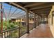 Covered patio overlooking a lush courtyard and pool at 33642 Blanton Rd, Dade City, FL 33523