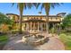Mediterranean-style home with fountain and lush landscaping at 33642 Blanton Rd, Dade City, FL 33523