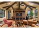 Relaxing game room with a large entertainment center and seating at 33642 Blanton Rd, Dade City, FL 33523