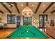 Game room with a pool table and jukebox at 33642 Blanton Rd, Dade City, FL 33523