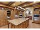Spacious kitchen with large island and decorative lighting at 33642 Blanton Rd, Dade City, FL 33523