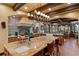 Open kitchen with breakfast bar and a view of the dining area at 33642 Blanton Rd, Dade City, FL 33523