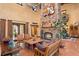 Living area featuring a stone fireplace and comfortable seating at 33642 Blanton Rd, Dade City, FL 33523