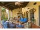 Outdoor patio with seating area and a view of the garden at 33642 Blanton Rd, Dade City, FL 33523