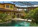 Stunning pool with stone bridge and lush landscaping at 33642 Blanton Rd, Dade City, FL 33523
