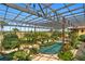 Resort-style pool with lush landscaping and serene outdoor space at 33642 Blanton Rd, Dade City, FL 33523