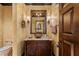 Small bathroom with wood vanity and vessel sink at 33642 Blanton Rd, Dade City, FL 33523