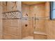 Large walk in shower with tiled walls and seat at 33642 Blanton Rd, Dade City, FL 33523