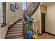 Grand curved staircase with decorative tile accents at 33642 Blanton Rd, Dade City, FL 33523