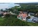 Luxury home with pool, viewed from above, shows waterfront location at 109 Wateredge Ct, Safety Harbor, FL 34695