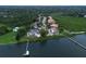 Waterfront community with various homes and a boat dock at 109 Wateredge Ct, Safety Harbor, FL 34695