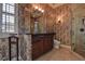 Bathroom with granite vanity, patterned wallpaper, and glass shower at 109 Wateredge Ct, Safety Harbor, FL 34695