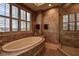 Bathroom featuring a luxurious soaking tub and walk-in shower at 109 Wateredge Ct, Safety Harbor, FL 34695