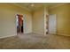 Bright bedroom with carpeted floor and access to a private bathroom at 109 Wateredge Ct, Safety Harbor, FL 34695