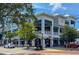 Two-story commercial building with outdoor seating and street views at 109 Wateredge Ct, Safety Harbor, FL 34695