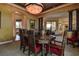 Elegant formal dining room with a large wood table and seating for six at 109 Wateredge Ct, Safety Harbor, FL 34695