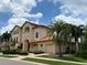 Attractive two-story house with a three-car garage and lush landscaping at 109 Wateredge Ct, Safety Harbor, FL 34695