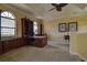 Home office with built-in wooden bookcases and hardwood floors at 109 Wateredge Ct, Safety Harbor, FL 34695