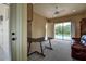 Home office with built-in bookshelves, leather couch, and a large desk at 109 Wateredge Ct, Safety Harbor, FL 34695