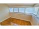 Attic space featuring hardwood floors, natural light from multiple windows and neutral walls at 1414 7Th S St, St Petersburg, FL 33701