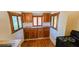 Cozy kitchen featuring wood cabinets, vintage window frames, and an electric range, blending charm and functionality at 1414 7Th S St, St Petersburg, FL 33701