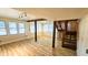 Bright living room with large windows, new floors, and open floorplan at 1414 7Th S St, St Petersburg, FL 33701