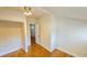 Bright room showcasing hardwood floors, natural light and open doorways at 1414 7Th S St, St Petersburg, FL 33701