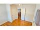 Room featuring hardwood floors, natural light, open doorways and white trim at 1414 7Th S St, St Petersburg, FL 33701
