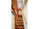 Unique staircase with wood steps and modern railing at 1414 7Th S St, St Petersburg, FL 33701