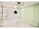 Spacious living room with tile floors and a sliding glass door at 11485 Oakhurst Rd # 221, Largo, FL 33774