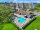 Community pool with a spa and lounge area at 960 Starkey Rd # 3406, Largo, FL 33771