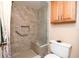 Updated bathroom with walk-in shower and grab bar at 12300 Vonn Rd # 3204, Largo, FL 33774