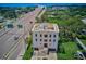 Aerial view of a modern home near a highway at 3087, 3075 Cherry Ln, Clearwater, FL 33759