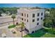 Multi-story house with a rooftop deck and a large yard at 3087, 3075 Cherry Ln, Clearwater, FL 33759