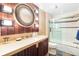 Elegant bathroom with a walk-in shower and modern vanity at 3087, 3075 Cherry Ln, Clearwater, FL 33759