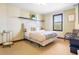 Cozy bedroom with a comfortable bed and window at 3087, 3075 Cherry Ln, Clearwater, FL 33759