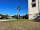 Exterior view of a building and empty lot at 3087, 3075 Cherry Ln, Clearwater, FL 33759