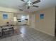Bright kitchen and dining area combo with tile floors and white cabinets at 300 6Th N St # 8, Safety Harbor, FL 34695