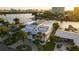 Luxury waterfront home aerial view, showcasing unique architecture & canal views at 42 Midway Is, Clearwater, FL 33767