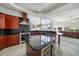 Modern kitchen with granite countertops and stainless steel appliances at 42 Midway Is, Clearwater, FL 33767