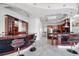 Kitchen with breakfast bar and dark wood cabinetry at 42 Midway Is, Clearwater, FL 33767