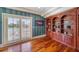 Bright library with built-in bookshelves and water views at 42 Midway Is, Clearwater, FL 33767