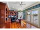 Home office with built-in wood shelving and water views at 42 Midway Is, Clearwater, FL 33767