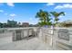 Modern outdoor kitchen with grill and stainless steel appliances at 42 Midway Is, Clearwater, FL 33767