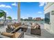 Relaxing patio with fire pit and comfortable seating at 42 Midway Is, Clearwater, FL 33767