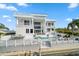 Resort-style pool and spa with expansive patio, ideal for outdoor entertaining at 42 Midway Is, Clearwater, FL 33767