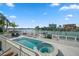 Inviting pool and spa area with a spacious deck and water views at 42 Midway Is, Clearwater, FL 33767